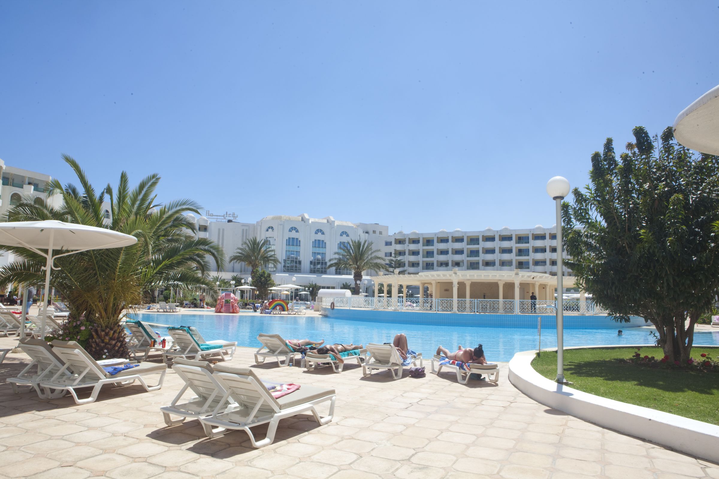 Sun loungers by the pool at El Mouradi Hammamet, Yasmine Hammamet - Just Sunshine Holidays